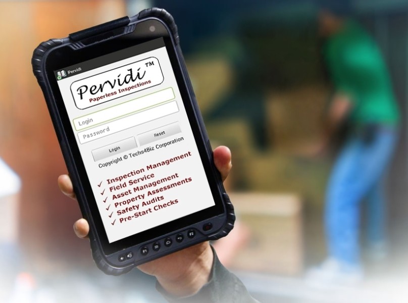 Operator completing a digital pre-start check on a mobile device before starting a vehicle or piece of equipment