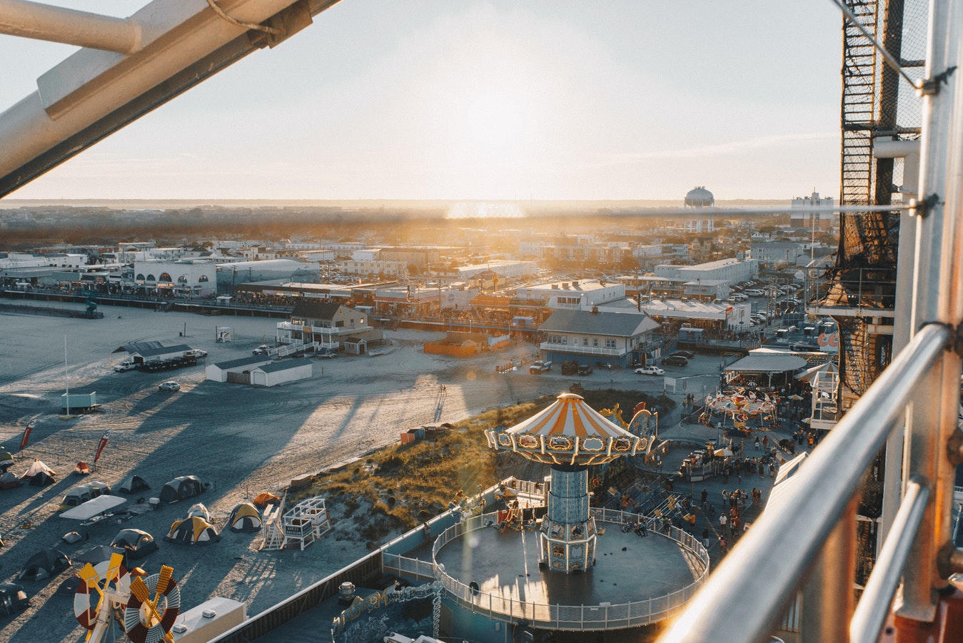 Aerial view of an amusement park showing rides and visitor areas requiring regular safety inspection