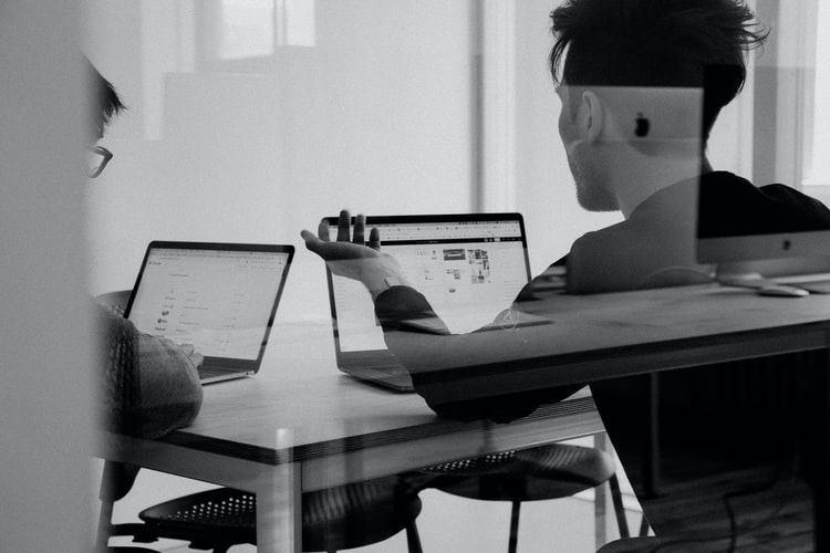Dashboard showing business intelligence charts and inspection data analytics on a laptop screen