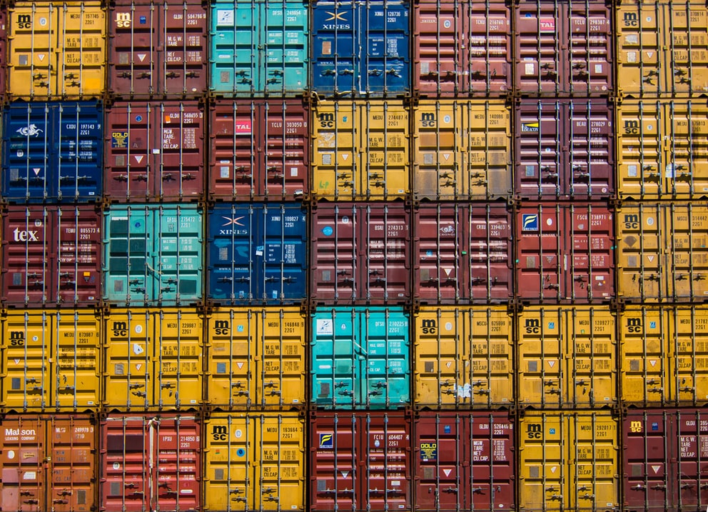Port inspector using a mobile device to conduct a digital container inspection at a shipping terminal
