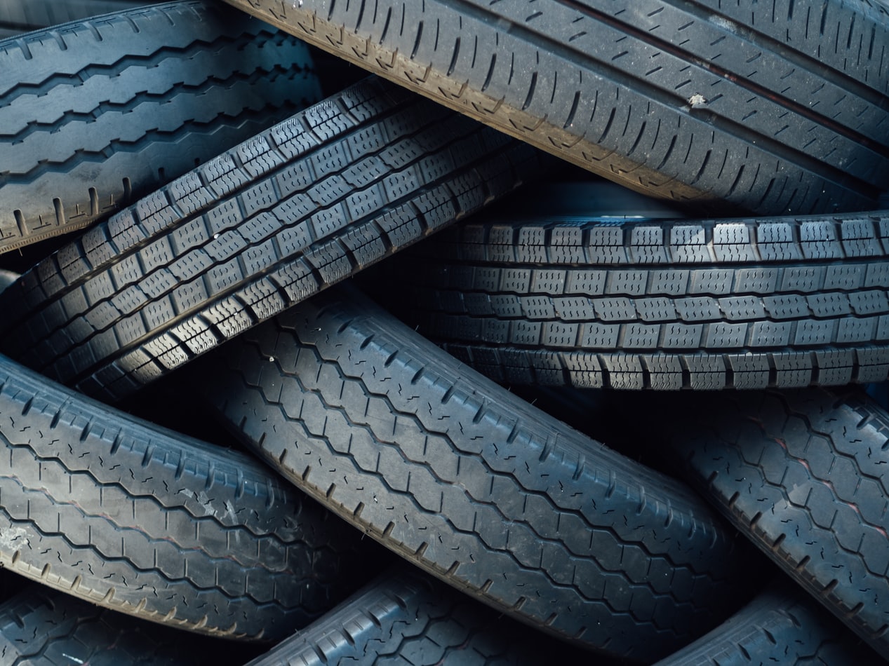 Close-up inspection of rubber components and conveyor belts in an industrial setting