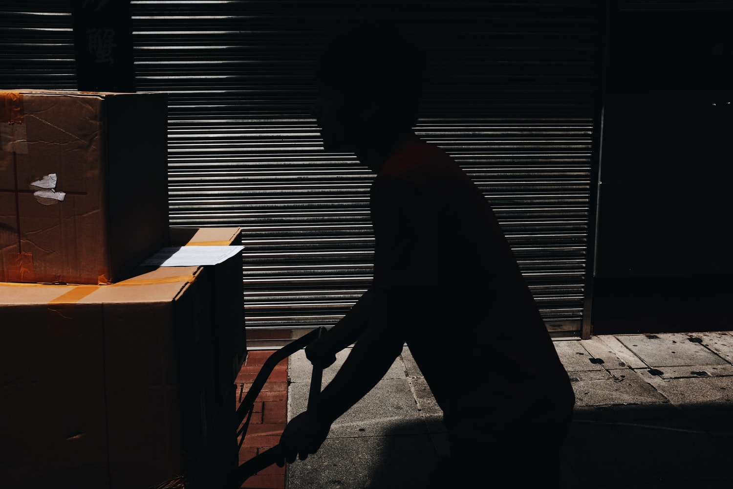 Retail worker conducting a digital stock inspection and inventory count using a mobile device