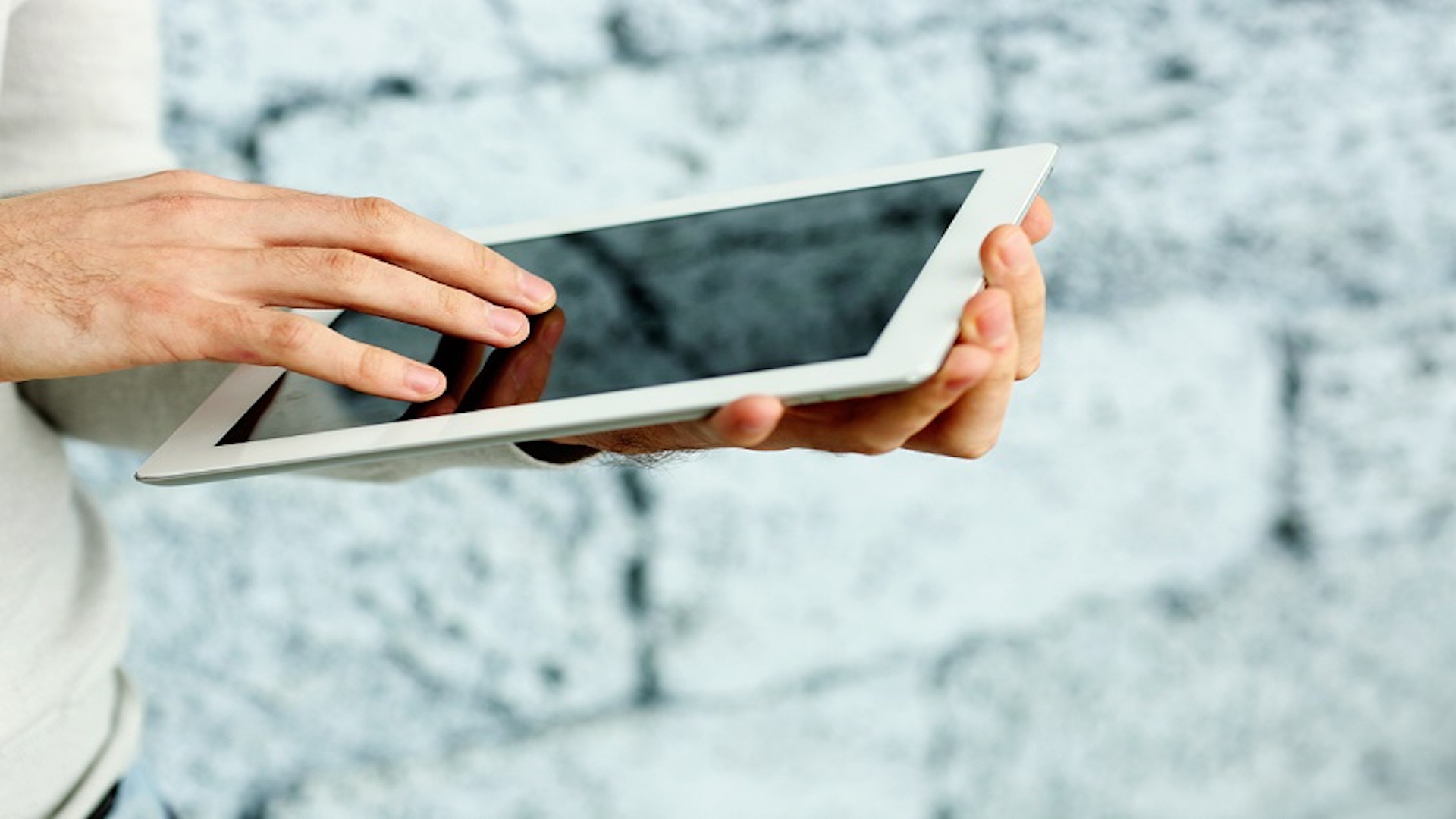 Field worker completing a digital inspection checklist on a tablet