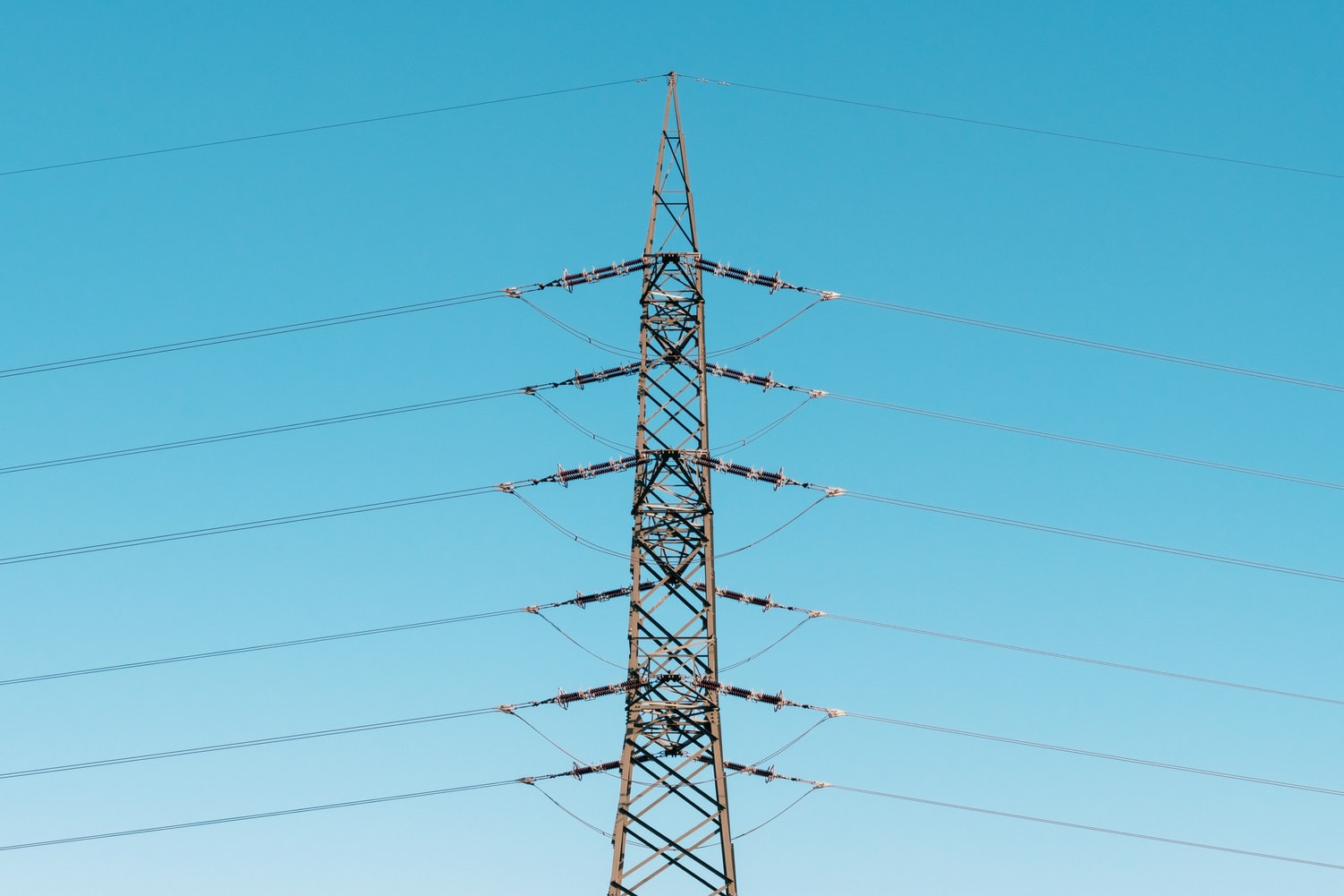 Utility infrastructure including power lines, substations, and gas pipelines representing the assets covered by a paperless utility inspection programme